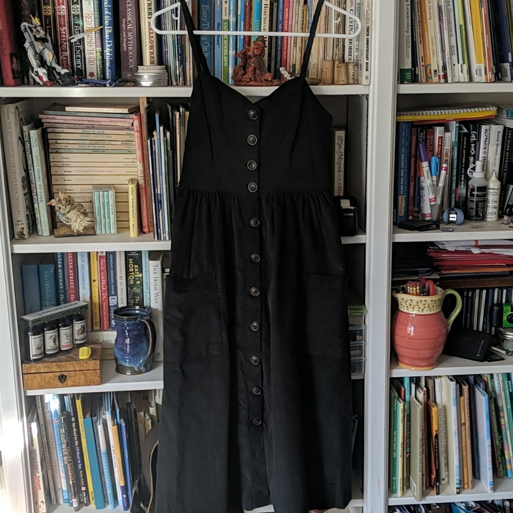 Deep green midi-dress, thin corduroy.